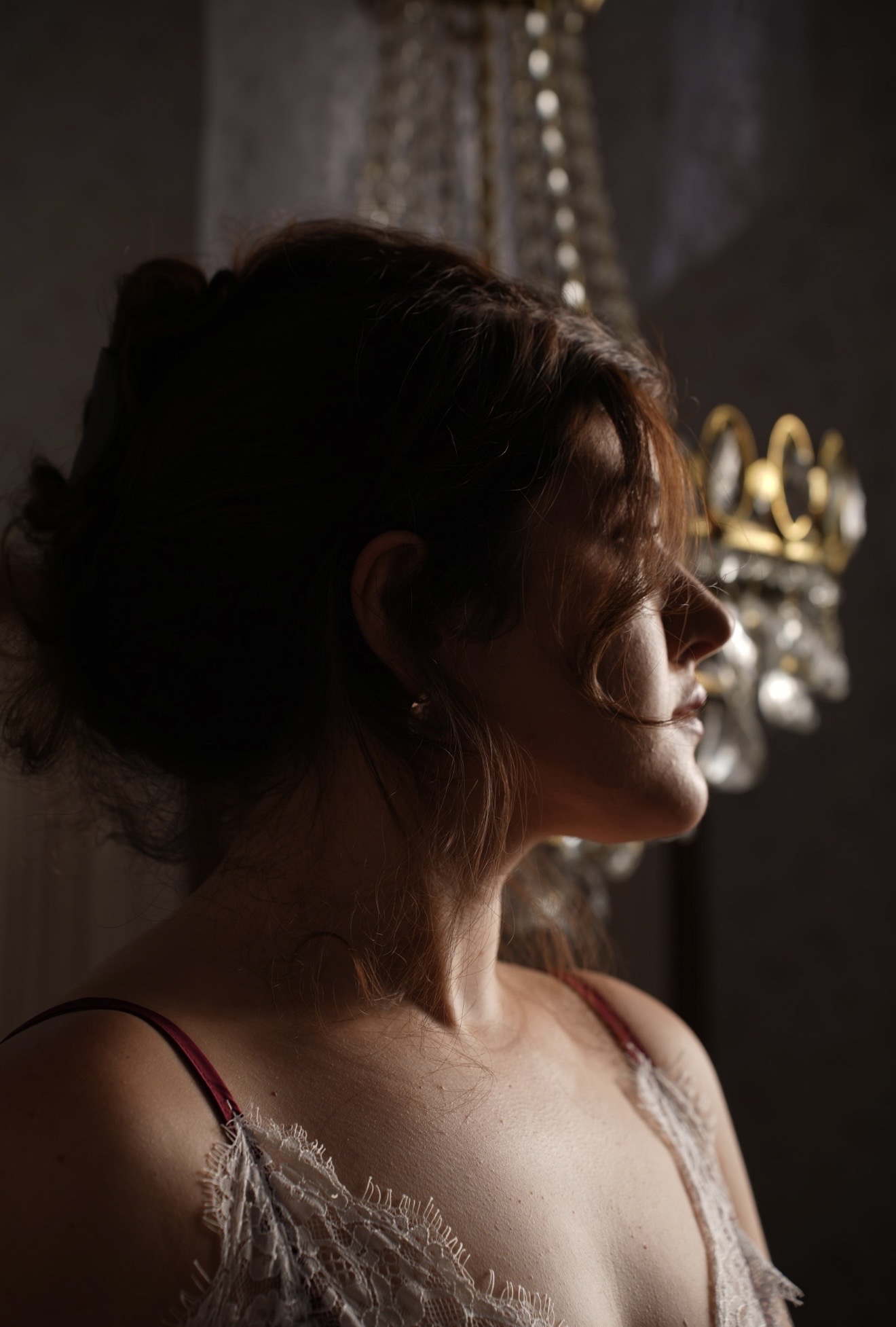 Profile portrait of Leeza Maroe in lace